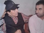 Dharmendra with Buta Singh Deol, the son of his cousin Manjit Singh, at their native village of Dangon near Sahnewal in Ludhiana district of Punjab. (File photo) Dharmendra with Buta Singh Deol, the son of his cousin Manjit Singh, at their native village of Dangon near Sahnewal in Ludhiana district of Punjab. (File photo)