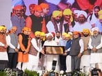 Punjab CM Bhagwant Mann, Sri Sri Ravi Shankar, AAP supremo Arvind Kejriwal, governor Gulab Chand Kataria and state ministers during Sarv Dharam Samelan in Anandpur Sahib on Sunday. (HT) Punjab CM Bhagwant Mann, Sri Sri Ravi Shankar, AAP supremo Arvind Kejriwal, governor Gulab Chand Kataria and state ministers during Sarv Dharam Samelan in Anandpur Sahib on Sunday. (HT)
