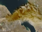 A satellite image shows ash rising from the eruption of the Hayli Gubbi volcano in Ethiopia as it drifts over the Red Sea, November 23, 2025.