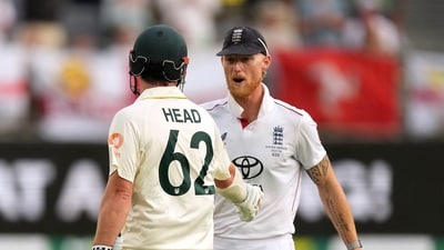 England's Ben Stokes congratulates Australia's Travis Head as he walks after losing his wicket. (REUTERS)