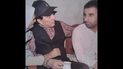 Dharmendra with Buta Singh Deol, the son of his cousin Manjit Singh, at their native village of Dangon near Sahnewal in Ludhiana district of Punjab. (File photo) Dharmendra with Buta Singh Deol, the son of his cousin Manjit Singh, at their native village of Dangon near Sahnewal in Ludhiana district of Punjab. (File photo)