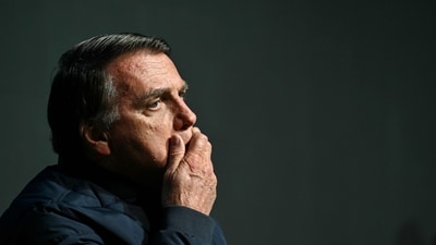 Jair Bolsonaro gestures during the CPAC Brazil conference in Balneario Camboriu, Santa Catarina State, Brazil. (Photo by Evaristo Sa / AFP) (AFP) Jair Bolsonaro gestures during the CPAC Brazil conference in Balneario Camboriu, Santa Catarina State, Brazil. (Photo by Evaristo Sa / AFP) (AFP)