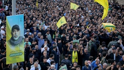 Mourners carry the coffins of top Hezbollah chief Haytham Ali Tabatabai and others killed in an Israeli strike a day earlier, during their funeral in Beirut�s southern suburbs on November 24, 2025. (AFP) Mourners carry the coffins of top Hezbollah chief Haytham Ali Tabatabai and others killed in an Israeli strike a day earlier, during their funeral in Beirut�s southern suburbs on November 24, 2025. (AFP)