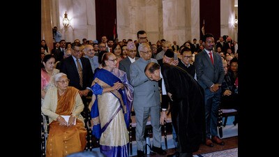 Newly sworn-in Chief Justice of India justice Surya Kant takes blessings from his parents after taking oath at Rashtrapati Bhavan in New Delhi on Monday. (ANI photo) Newly sworn-in Chief Justice of India justice Surya Kant takes blessings from his parents after taking oath at Rashtrapati Bhavan in New Delhi on Monday. (ANI photo)