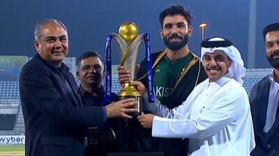 Mohsin Naqvi hands over the Rising Asia Cup trophy. (@ReplaysPCT/x.com) Mohsin Naqvi hands over the Rising Asia Cup trophy. (@ReplaysPCT/x.com)