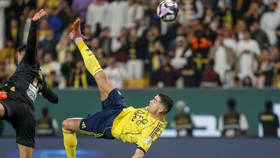 Nassr's Portuguese forward #07 Cristiano Ronaldo (R) kicks the ball to score his team's fourth goal (AFP)