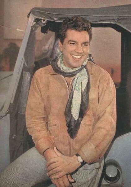 Dharmendra rocking the preppy vibes featuring earthy tone staples and a scarf Dharmendra rocking the preppy vibes featuring earthy tone staples and a scarf