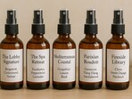 Five elegant DIY room sprays sit ready to transform any space into a fragrant, welcoming, and hotel-inspired home environment.(Ai Generated)