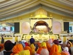 Devotees at the venue of the state-level function attended by Prime Minister Narendra Modi to mark the 350th martyrdom anniversary of the ninth Sikh Guru, Guru Tegh Bahadur, at Jyotisar near Kurukshetra on Tuesday. (HT Photo) Devotees at the venue of the state-level function attended by Prime Minister Narendra Modi to mark the 350th martyrdom anniversary of the ninth Sikh Guru, Guru Tegh Bahadur, at Jyotisar near Kurukshetra on Tuesday. (HT Photo)