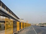 NHAI officials said that the railing along the 18 kilometre corridor is underway to prevent accidents and stop traversing. (Parveen Kumar/HT) NHAI officials said that the railing along the 18 kilometre corridor is underway to prevent accidents and stop traversing. (Parveen Kumar/HT)
