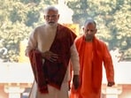 Prime Minister Narendra Modi with Uttar Pradesh chief minister Yogi Adityanath arrives to offer prayers at a temple in Ayodhya Prime Minister Narendra Modi with Uttar Pradesh chief minister Yogi Adityanath arrives to offer prayers at a temple in Ayodhya