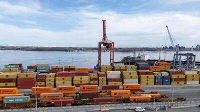 A drone view shows cranes, shipping containers and transport trucks at the Port of Montreal in Montreal, Quebec, Canada. (REUTERS) A drone view shows cranes, shipping containers and transport trucks at the Port of Montreal in Montreal, Quebec, Canada. (REUTERS)