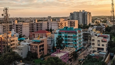 With property prices climbing, many NRIs say homes in Indian metros now cost as much as those abroad, with some claiming better value and returns in countries like Australia and Germany. (Representational Image) (Unsplash ) With property prices climbing, many NRIs say homes in Indian metros now cost as much as those abroad, with some claiming better value and returns in countries like Australia and Germany. (Representational Image) (Unsplash )