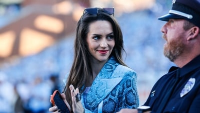Jordon Hudson, girlfriend of Head coach Bill Belichick of the North Carolina Tar Heels, is suing sports journalist Pablo Torre. (Getty Images via AFP) Jordon Hudson, girlfriend of Head coach Bill Belichick of the North Carolina Tar Heels, is suing sports journalist Pablo Torre. (Getty Images via AFP)