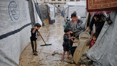 The United Nations humanitarian office last week said the downpours have damaged at least 13,000 tents. (AP) The United Nations humanitarian office last week said the downpours have damaged at least 13,000 tents. (AP)