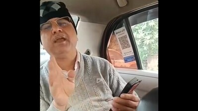 A viral clip showed a cab driver refusing AC because the passenger wore a cap and sweater, sparking mixed reactions online. (Facebook/ Tricity Cab Association) A viral clip showed a cab driver refusing AC because the passenger wore a cap and sweater, sparking mixed reactions online. (Facebook/ Tricity Cab Association)