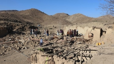Residents gather at a damaged house after an air strike by Pakistan, in Jige Mughalgai in Khost province on November 25, 2025. (AFP) Residents gather at a damaged house after an air strike by Pakistan, in Jige Mughalgai in Khost province on November 25, 2025. (AFP)