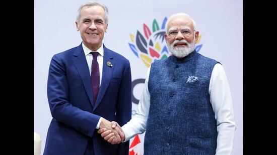 Indian Prime Minister Narendra Modi (right) shakes hands with Canada Prime Minister Mark Carney during a bilateral meeting on the sidelines of G20 Summit, in Johannesburg on Sunday. (ANI)