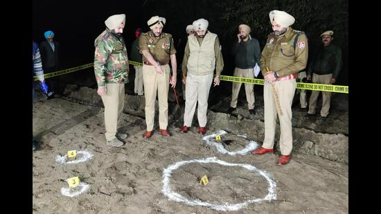 Police at the site of the encounter in Amritsar on Tuesday. (HT Photo)