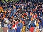 PU Bachao Morcha activists protesting outside Gate Number 2 on Tuesday night . (Keshav Singh/HT) PU Bachao Morcha activists protesting outside Gate Number 2 on Tuesday night . (Keshav Singh/HT)