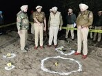 Police at the site of the encounter in Amritsar on Tuesday. (HT Photo)