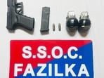 The state special operations cell (SSOC), Fazilka, has busted a cross-border weapon-smuggling module operating along the India-Pakistan border with the arrest of two persons and recovering two hand grenades, a 9mm Glock pistol and live cartridges from their possession, officials said on Tuesday. The state special operations cell (SSOC), Fazilka, has busted a cross-border weapon-smuggling module operating along the India-Pakistan border with the arrest of two persons and recovering two hand grenades, a 9mm Glock pistol and live cartridges from their possession, officials said on Tuesday.