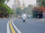 Three parallel markings—one yellow and two white—across the entire stretch on Basant Singh Khalsa Road in Ludhiana on Wednesday. (Manish/HT) Three parallel markings—one yellow and two white—across the entire stretch on Basant Singh Khalsa Road in Ludhiana on Wednesday. (Manish/HT)