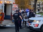An unidentified man in military fatigues lies on a stretcher and is wheeled to a waiting ambulance on November 26, 2025 in downtown Washington, DC. An unidentified man in military fatigues lies on a stretcher and is wheeled to a waiting ambulance on November 26, 2025 in downtown Washington, DC.