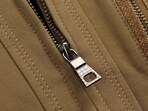 The quarter-zip is a type of sweater with the a zipper going just a quarter of the way down its length.