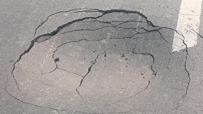 A cave in seen on the road on November 2 this year. A cave in seen on the road on November 2 this year.