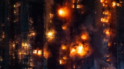 Over 140 fire trucks and 60 ambulances were deployed at the scene to bring the fire under control and rescue people stuck inside the building. (AP) Over 140 fire trucks and 60 ambulances were deployed at the scene to bring the fire under control and rescue people stuck inside the building. (AP)