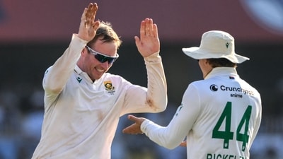 South Africa's Simon Harmer (L) celebrates with teammate Ryan Rickelton (AFP) South Africa's Simon Harmer (L) celebrates with teammate Ryan Rickelton (AFP)