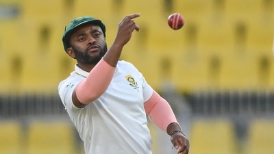 Temba Bavuma tosses the ball during the fourth day of the second Test cricket match between India and South Africa in Guwahati on November 25 (AFP) Temba Bavuma tosses the ball during the fourth day of the second Test cricket match between India and South Africa in Guwahati on November 25 (AFP)
