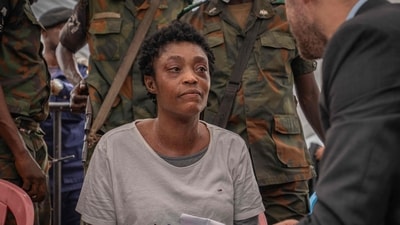 Honorine Porsche, a German woman prosecuted by the Congolese courts after attempting to rob a bank, looks on during a court apparence in Kinshasa on October 24, 2025. (File/AFP) Honorine Porsche, a German woman prosecuted by the Congolese courts after attempting to rob a bank, looks on during a court apparence in Kinshasa on October 24, 2025. (File/AFP)