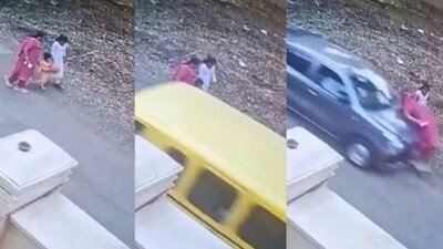 The footage shows the former Igatpuri MLA walking along the roadside when a car approaches from behind and hits her without any warning. (X/Hate Detector) The footage shows the former Igatpuri MLA walking along the roadside when a car approaches from behind and hits her without any warning. (X/Hate Detector)