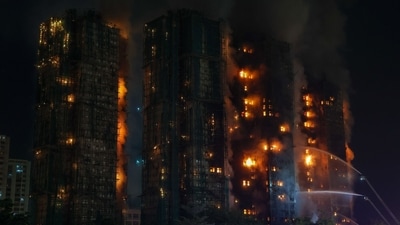 At least 15 more people were injured in the blaze in the housing estate in northern Hong Kong on Wednesday, officials from the police and fire department said at a press conference. (Bloomberg) At least 15 more people were injured in the blaze in the housing estate in northern Hong Kong on Wednesday, officials from the police and fire department said at a press conference. (Bloomberg)