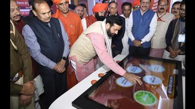 Haryana chief minister Nayab Singh Saini at a stall during an exhibition in Kurukshetra on Wednesday. (HT Photo)