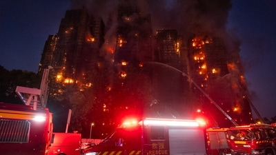 Firefighters try to extinguish a fire that broke out at Wang Fuk Court, a residential estate in the Tai Po district of Hong Kong's New Territories, on Wednesday, November 26, 2025. (Chan Long Hei/AP Photo) Firefighters try to extinguish a fire that broke out at Wang Fuk Court, a residential estate in the Tai Po district of Hong Kong's New Territories, on Wednesday, November 26, 2025. (Chan Long Hei/AP Photo)