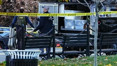 Agents with the Federal Bureau of Investigation (FBI) near the scene of a shooting in Washington, DC, US, on Wednesday, Nov. 26, 2025. Two National Guardsmen were shot in downtown Washington near the White House and a suspect is in custody, officials said Wednesday. Photographer: Aaron Schwartz/Bloomberg (Bloomberg) Agents with the Federal Bureau of Investigation (FBI) near the scene of a shooting in Washington, DC, US, on Wednesday, Nov. 26, 2025. Two National Guardsmen were shot in downtown Washington near the White House and a suspect is in custody, officials said Wednesday. Photographer: Aaron Schwartz/Bloomberg (Bloomberg)