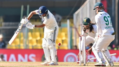 The first wicket of the day was that of overnight nightwatchman Kuldeep Yadav, seeing a straight one sneak through his defence and knock back his middle stump from Simon Harmer. (PTI) The first wicket of the day was that of overnight nightwatchman Kuldeep Yadav, seeing a straight one sneak through his defence and knock back his middle stump from Simon Harmer. (PTI)