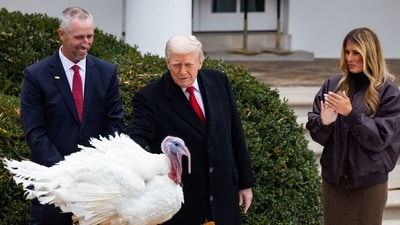 US First Lady Melania Trump, right, watches as President Donald Trump pardons Gobble, the 2025 National Thanksgiving Turkey, during a ceremony in the Rose Garden of the White House in Washington, DC, US, on Tuesday, Nov. 25, 2025. (Bloomberg) US First Lady Melania Trump, right, watches as President Donald Trump pardons Gobble, the 2025 National Thanksgiving Turkey, during a ceremony in the Rose Garden of the White House in Washington, DC, US, on Tuesday, Nov. 25, 2025. (Bloomberg)