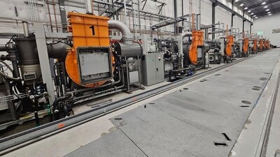 This photo provided by Noveon Magnetics, a row of specialized furnaces that are used to produce rare earth magnets sits inside the Noveon Magnetics plant in San Marcos, Texas.  (Noveon Magnetics via AP) (AP)