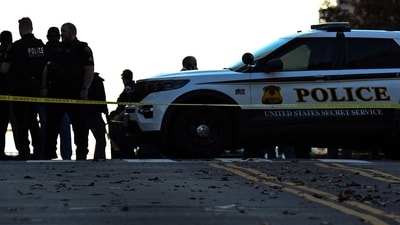 Law-enforcement officials visit the crime scene of a shooting in downtown Washington, DC, on November 26, 2025. On November 26, FBI Director Kash Patel told reporters two National Guard troops shot blocks away from the White House in downtown Washington were critically wounded, clarifying earlier erroneous reports that they had died. (Photo by Drew ANGERER / AFP) (AFP) Law-enforcement officials visit the crime scene of a shooting in downtown Washington, DC, on November 26, 2025. On November 26, FBI Director Kash Patel told reporters two National Guard troops shot blocks away from the White House in downtown Washington were critically wounded, clarifying earlier erroneous reports that they had died. (Photo by Drew ANGERER / AFP) (AFP)