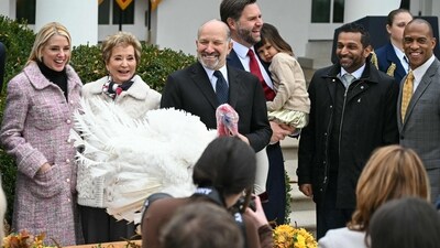 (L/R) US Attorney General Pam Bondi, Secretary of Education Linda McMahon, Commerce Secretary Howard Lutnick, Vice President JD Vance holding his daughter Mirabel, FBI Director Kash Patel, and Secretary of Housing and Urban Development Scott Turner look on after US President Donald Trump pardoned Gobble, one of the National Thanksgiving turkeys, during the turkey pardon ceremony in the Rose Garden of the White House in Washington, DC on November 25, 2025. (Photo by ANDREW CABALLERO-REYNOLDS / AFP) (AFP) (L/R) US Attorney General Pam Bondi, Secretary of Education Linda McMahon, Commerce Secretary Howard Lutnick, Vice President JD Vance holding his daughter Mirabel, FBI Director Kash Patel, and Secretary of Housing and Urban Development Scott Turner look on after US President Donald Trump pardoned Gobble, one of the National Thanksgiving turkeys, during the turkey pardon ceremony in the Rose Garden of the White House in Washington, DC on November 25, 2025. (Photo by ANDREW CABALLERO-REYNOLDS / AFP) (AFP)