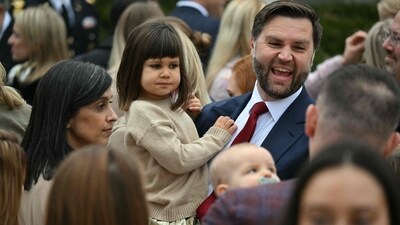 JD US Vice President JD Vance holds his daughter Mirabel as his wife, the Second Lady Usha Vance looks on after US President Donald Trump pardoned Gobble, one of the National Thanksgiving turkeys, during the turkey pardon ceremony in the Rose Garden of the White House in Washington, DC on November 25, 2025. (Photo by ANDREW CABALLERO-REYNOLDS / AFP) (AFP) JD US Vice President JD Vance holds his daughter Mirabel as his wife, the Second Lady Usha Vance looks on after US President Donald Trump pardoned Gobble, one of the National Thanksgiving turkeys, during the turkey pardon ceremony in the Rose Garden of the White House in Washington, DC on November 25, 2025. (Photo by ANDREW CABALLERO-REYNOLDS / AFP) (AFP)