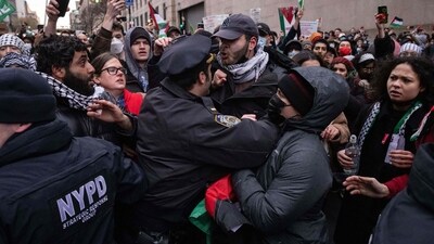 More than 2,000 people have been arrested for holding signs in support of the group. (AFP ) More than 2,000 people have been arrested for holding signs in support of the group. (AFP )