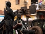 Soldiers patrol on the main road in Bissau, Guinea-Bissau, November 21, 2025. REUTERS/Luc Gnago     TPX IMAGES OF THE DAY