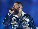 Post Malone performs during halftime of the game between the Kansas City Chiefs and Dallas Cowboys at AT&T Stadium