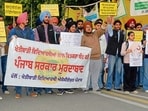 Students protesting at the PAU campus in Ludhiana on Thursday. (Manish/HT)