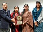 Suresh Rituparna, Director of the KK Birla Foundation (L), and Manju Bala, teacher in-charge of Vagmi (the debating society) (R), present a first prize to Lady Shri Ram College students, Arya Dixit along with Krishna Pathak during a Debate Competition by KK Birla Foundation at Hindu College on Wednesday. (Sanchit Khanna/HT) Suresh Rituparna, Director of the KK Birla Foundation (L), and Manju Bala, teacher in-charge of Vagmi (the debating society) (R), present a first prize to Lady Shri Ram College students, Arya Dixit along with Krishna Pathak during a Debate Competition by KK Birla Foundation at Hindu College on Wednesday. (Sanchit Khanna/HT)